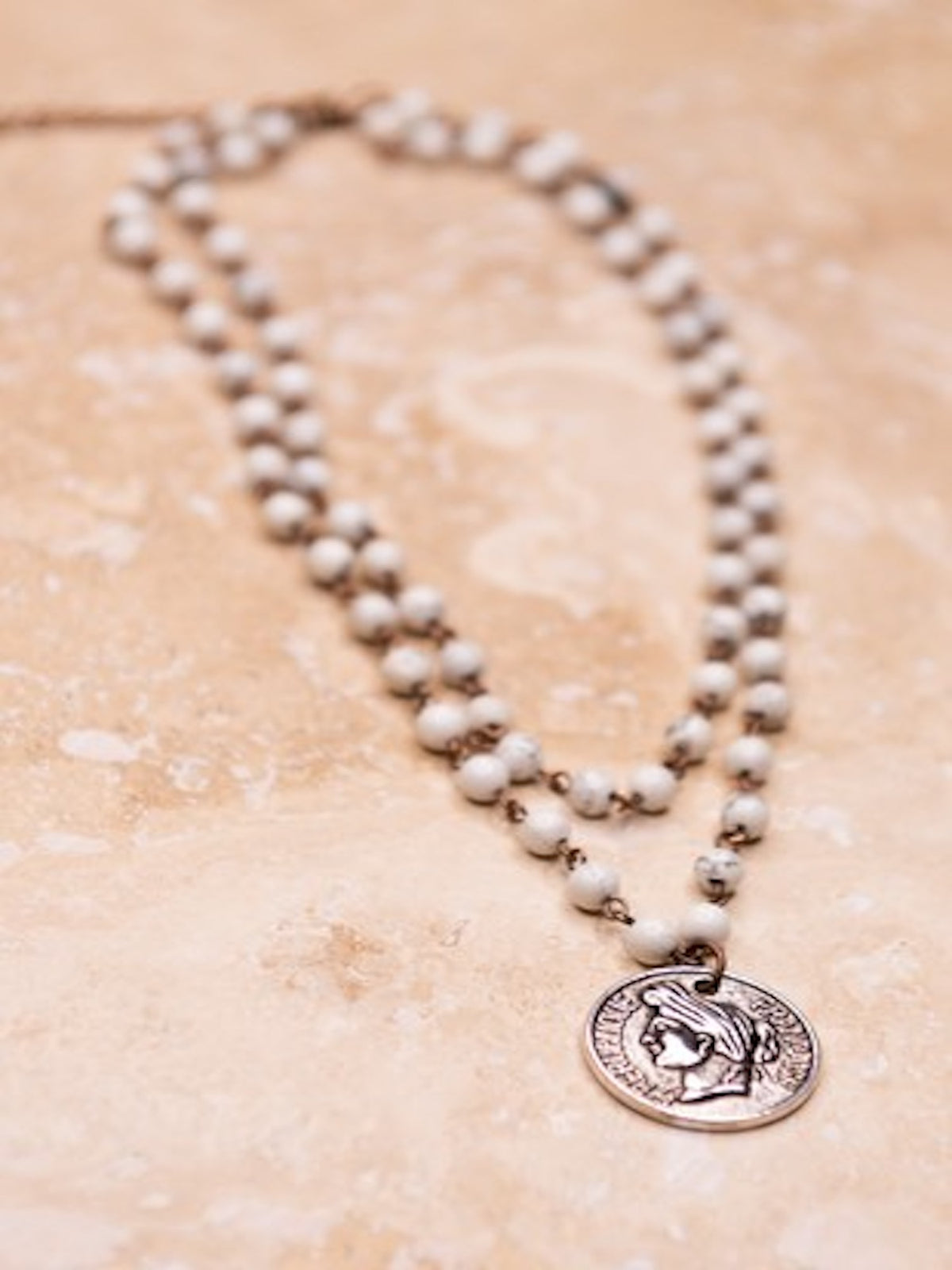 The White Bead Necklace