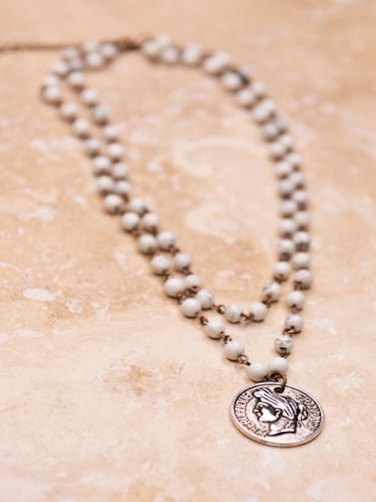 The White Bead Necklace